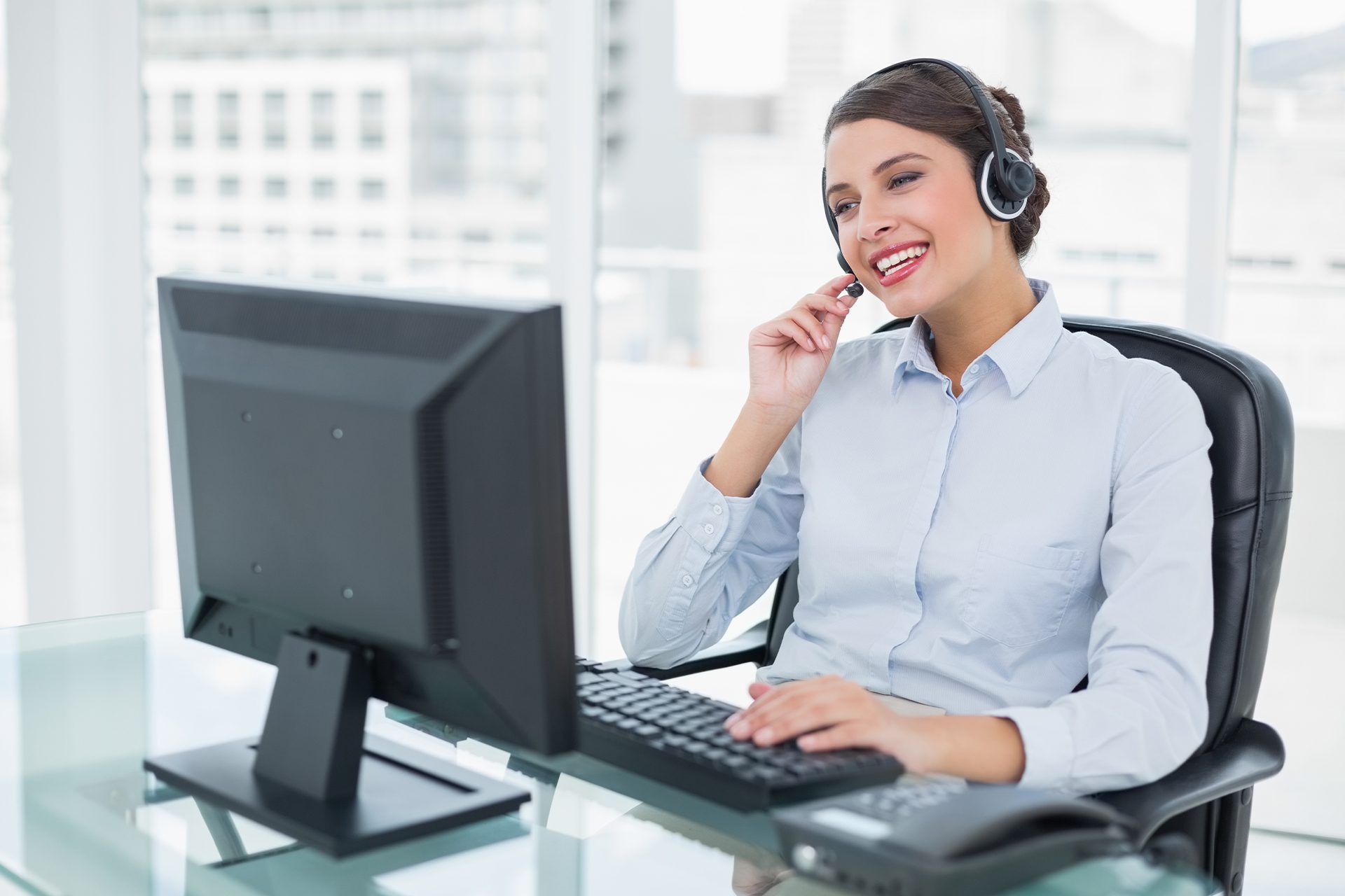 call-center A Person Writing on a Paper with Graph<br />